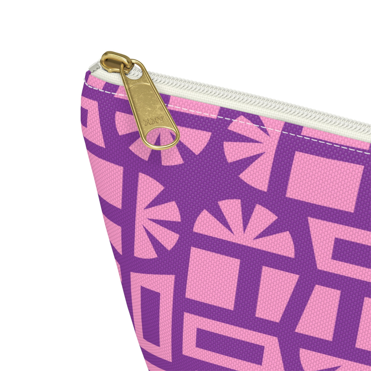 Close-up of the gold zipper pull on the Pink Purple Geometric Print makeup bag