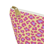 Close-up of the gold zipper pull and pink purple leopard spots on the makeup bag