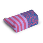 Pink and lilac striped cosmetic bag lying on its side
