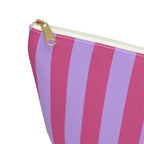 Close-up of the gold zipper pull and pink lilac stripes on the makeup bag