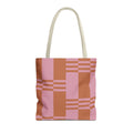 Pink terracotta color block tote bag with beige handles, front view on white background