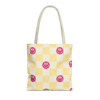 Pink yellow smiley checkered tote bag front view on white background