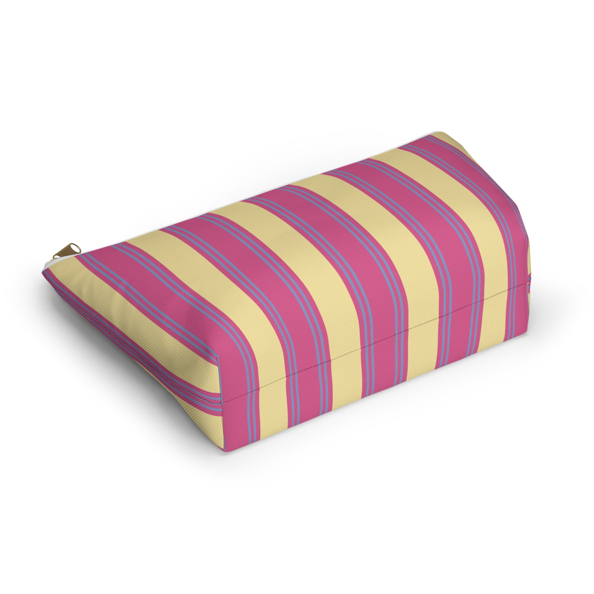 Angled view of the striped makeup bag lying on its side