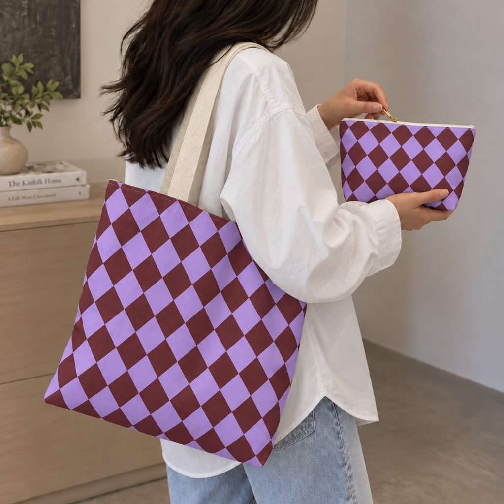 Woman with a checkered tote bag and matching purple burgundy makeup bag in hand