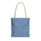 Purple green leopard print tote bag with beige handles on a white background