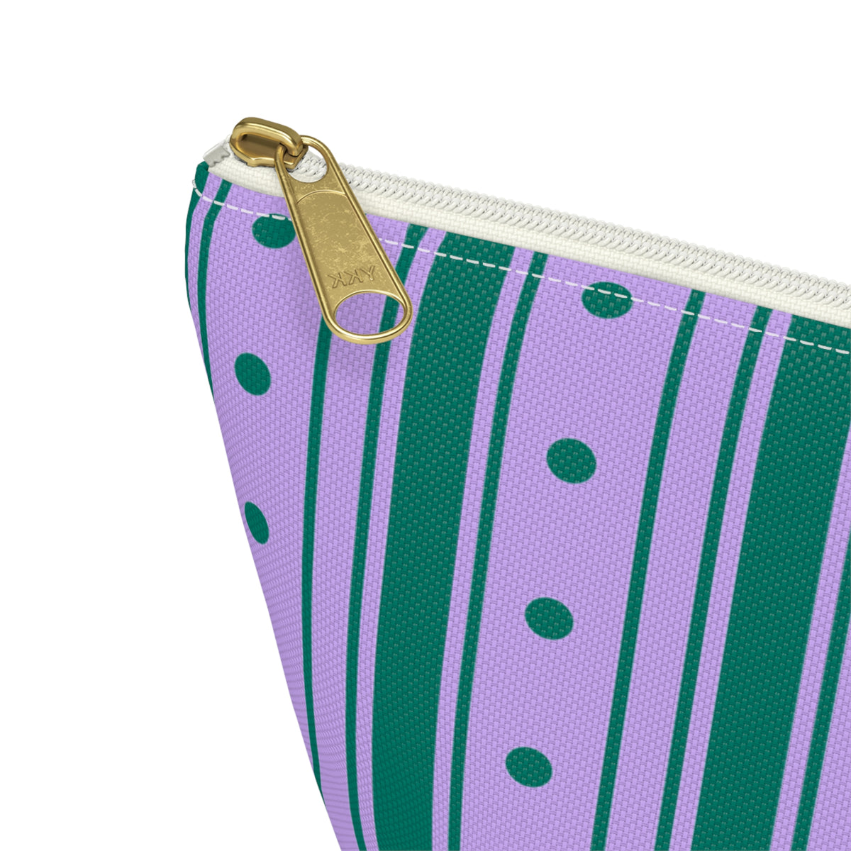Close-up of the gold zipper pull on the purple striped makeup bag