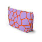 Purple orange giraffe print makeup bag standing at an angle
