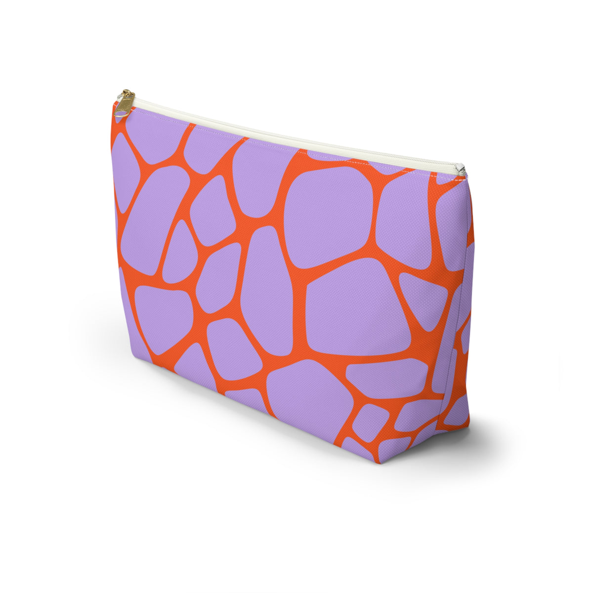 Purple orange giraffe print makeup bag standing at an angle