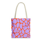 Purple orange giraffe print tote bag with beige handles on a white background