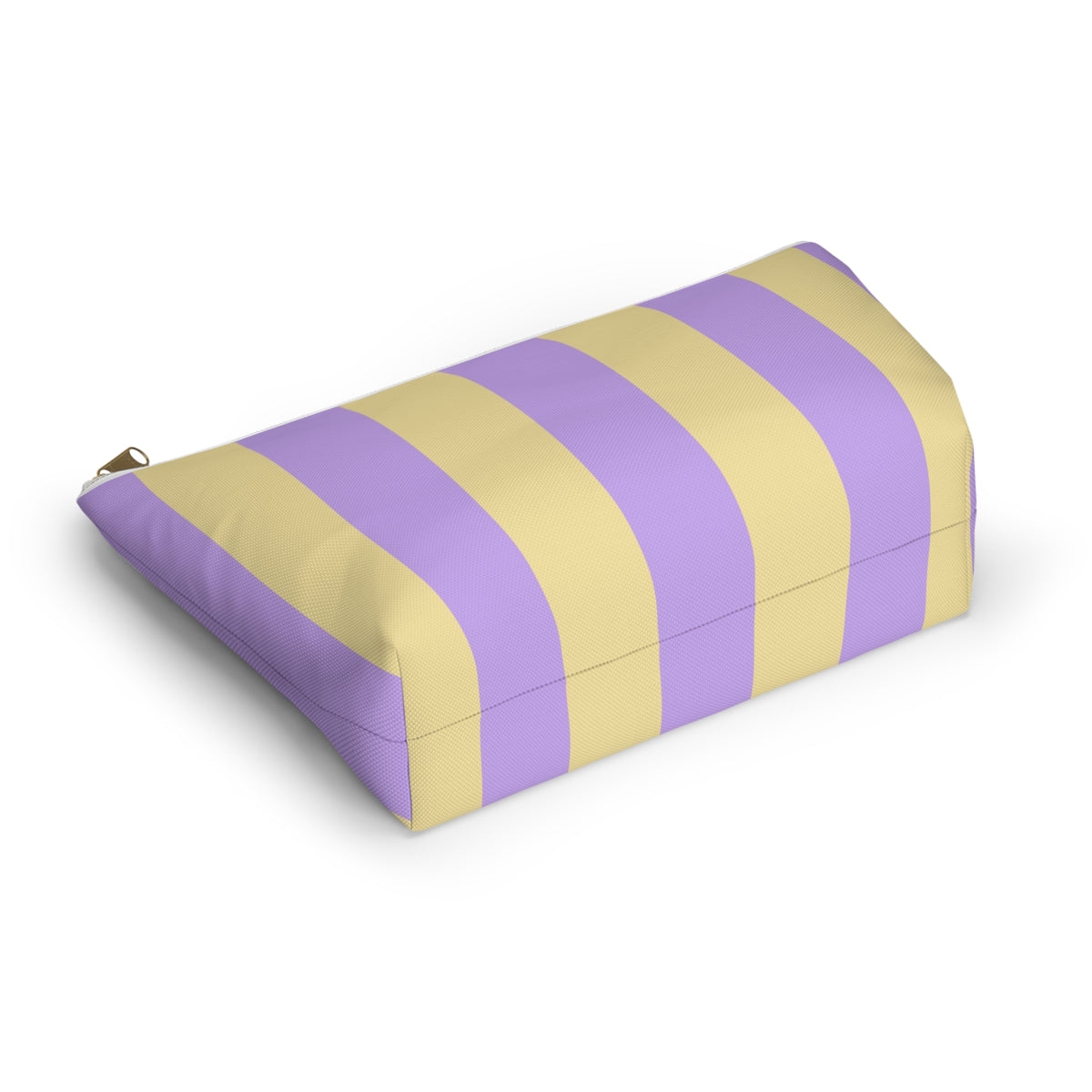 Angled view of the striped makeup bag lying on its side