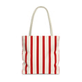 Red cream striped tote bag with beige handles, front view on white background
