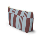 Side view of the sky blue burgundy block striped makeup bag with flat T-shaped bottom