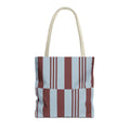 Sky blue burgundy block striped tote bag with beige handles, front view on white background