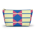 Yellow pink blue geometric makeup bag with gold zipper pull, front view on white background