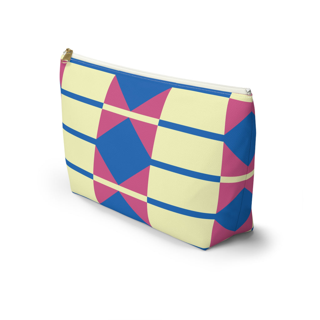 Side view of the geometric makeup bag in yellow, pink and blue with T-bottom shape