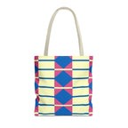 Yellow pink blue geometric tote bag, front view on white background